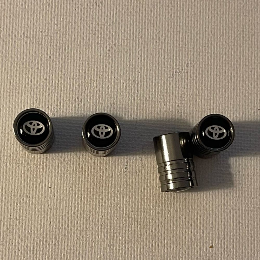 Toyota Logo valve Stem caps in Gray set of 4 NWT
